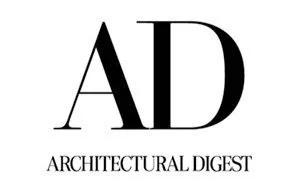 Logo for Architectural Digest with large 'AD' initials and small 'ARCHITECTURAL DIGEST' text underneath.