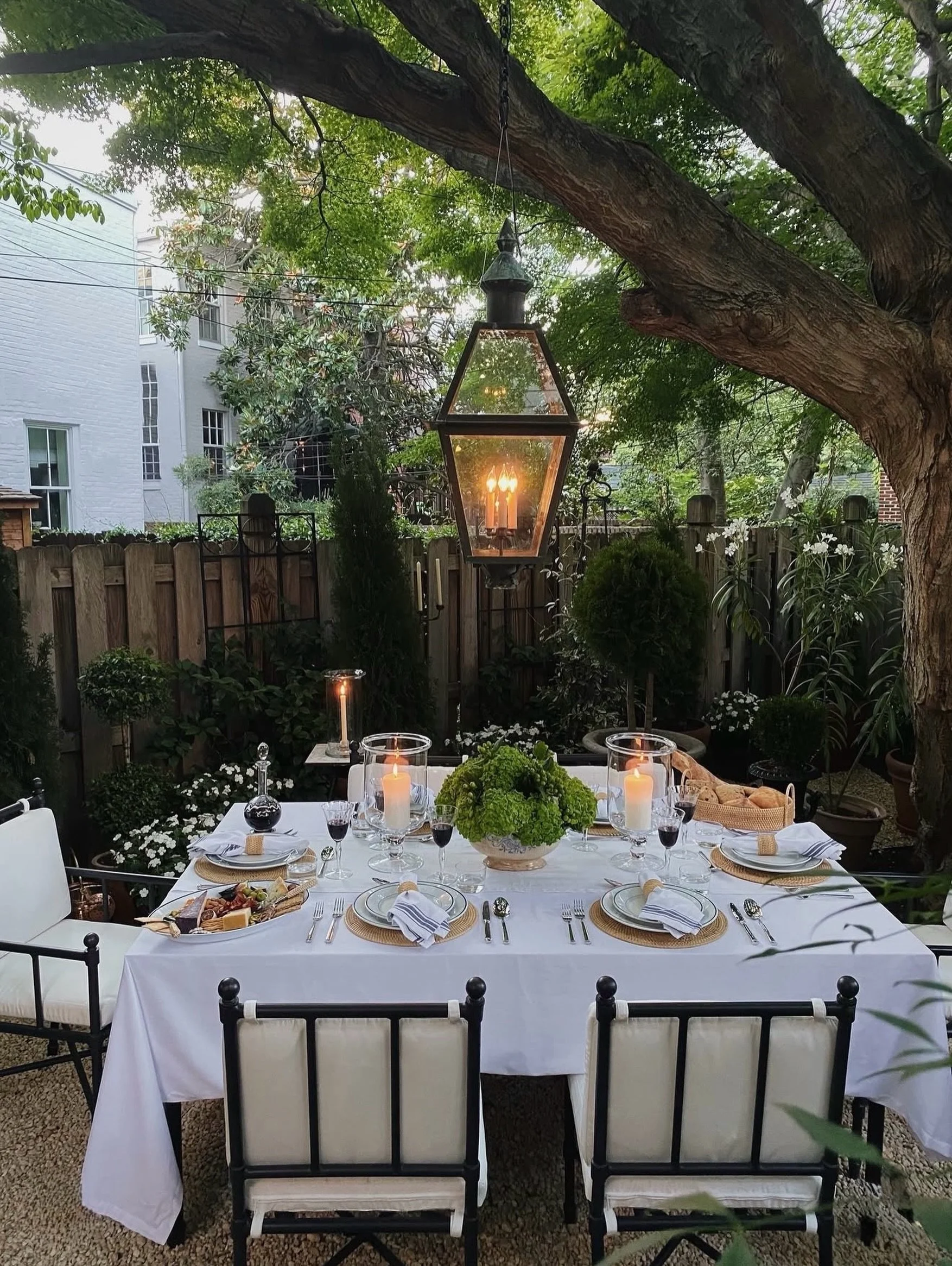 G A T H E R
The unofficial start of summer, beautifully set. ✨

Josh Young turned his city patio into an al fresco dream, complete with candlelight under the trees and a table that makes you want to stay all night.🕯️

📸 &amp; table by @jyoungdesign