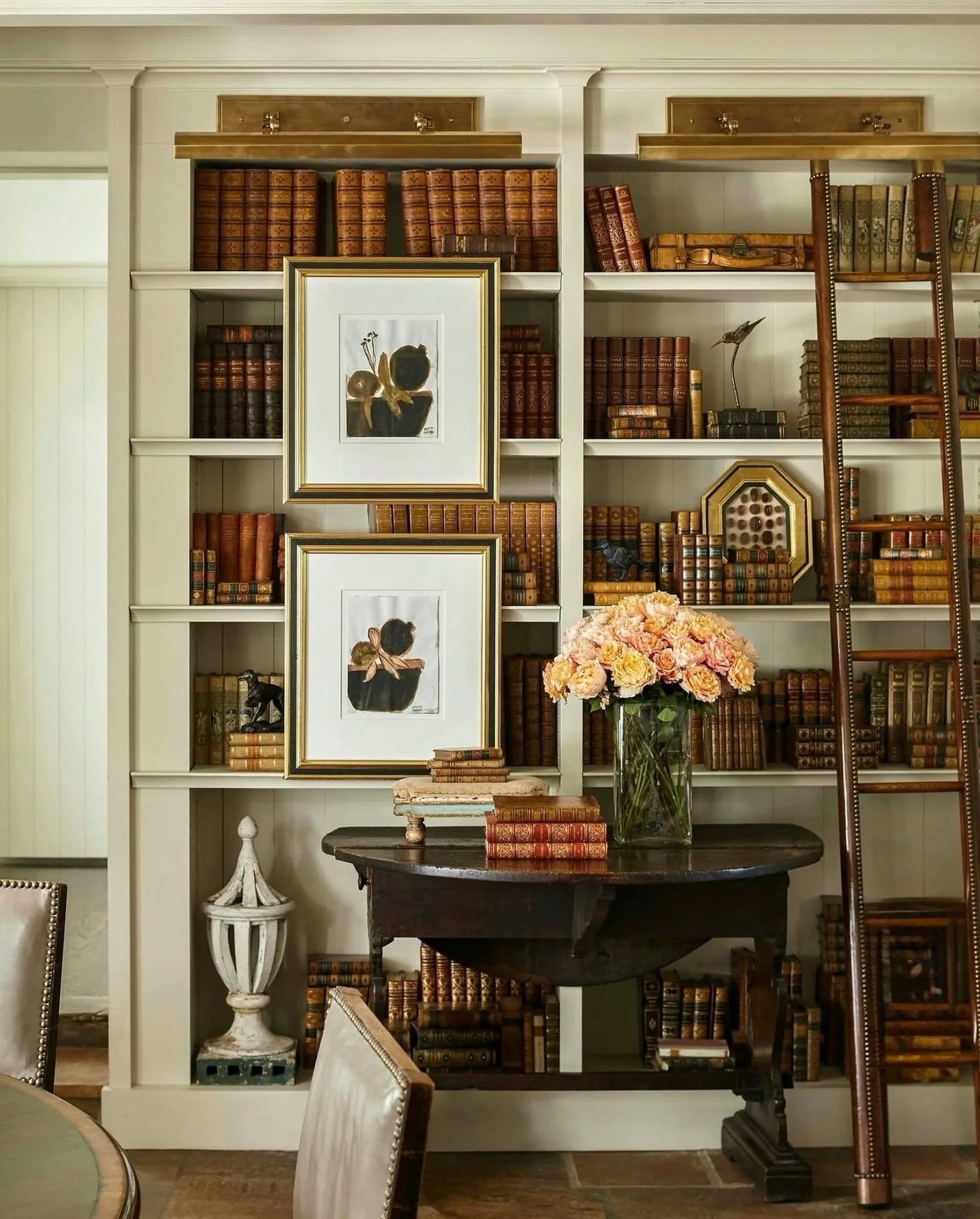 W E L L  R E A D
A library ladder may be practical, but it also changes the entire architecture of a room. 

These floor-to-ceiling books, the warm brass, collected art&hellip; just enough formality to make you want to stay awhile. 

And, can we give