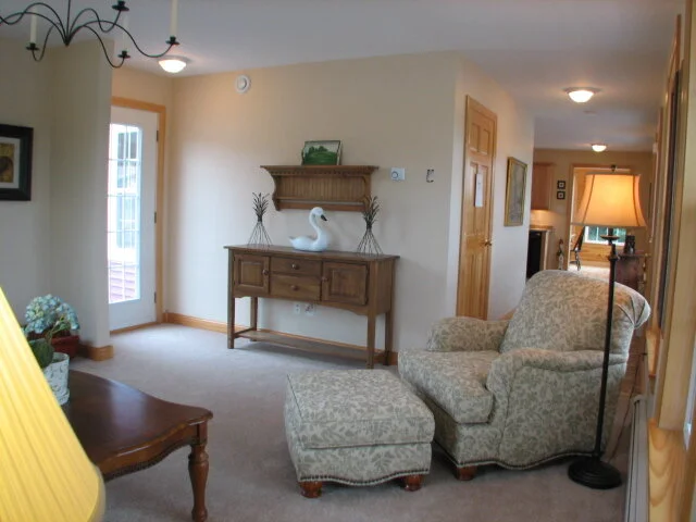 Formal Parlor into front entry, with door to back deck.