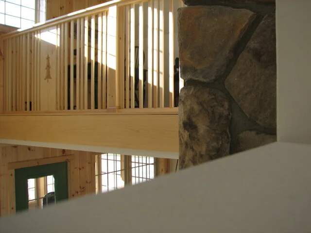 Stone Chimney and Pine Railing Details.
