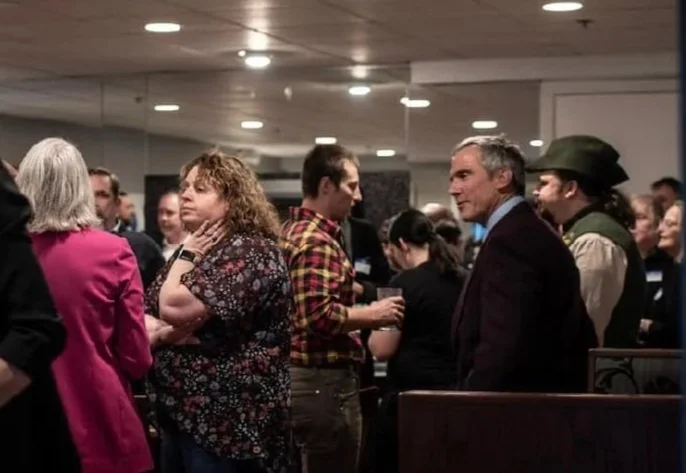 Packed room at a Lunenburg Business Association Meet and Mingle event bringing together business owners, CEOs, state representatives, and town leaders to connect and support the local business community.