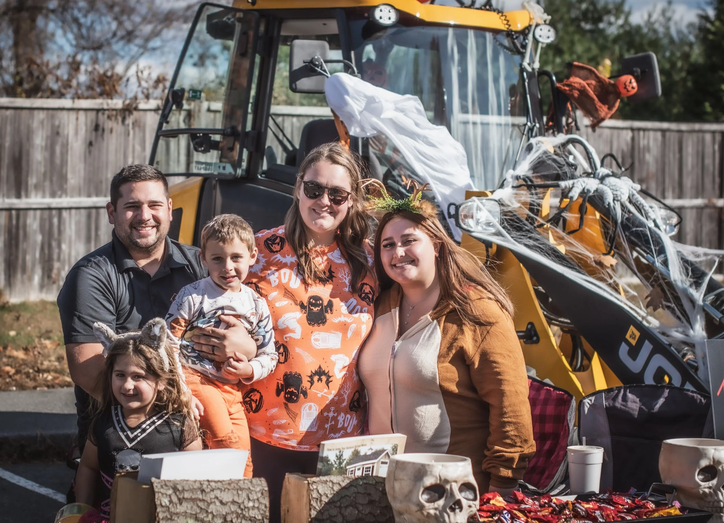 Local family-owned business participating in the Lunenburg Business Association’s annual Trunk or Treat, decorating their vehicle and welcoming families at a community Halloween event in Lunenburg, Massachusetts.