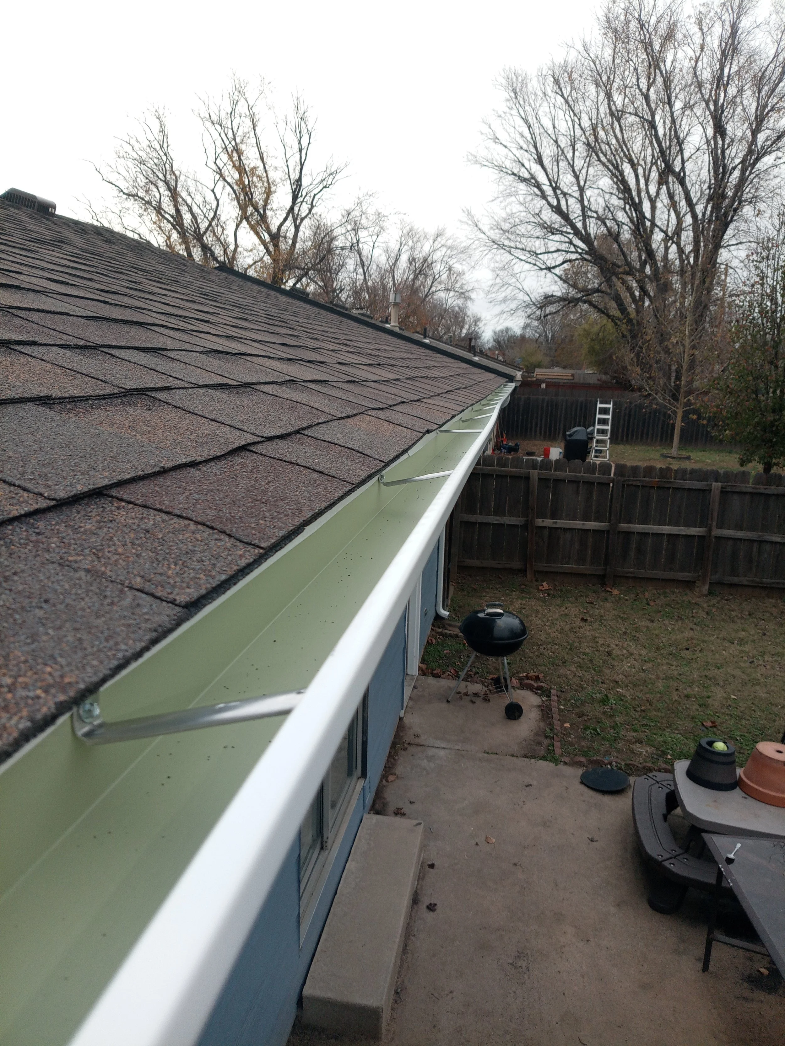 okc new roof with gutter installation