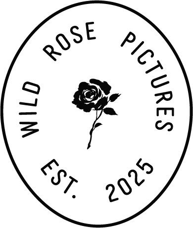 Black circular logo with the text 'Wild Rose Pictures' and 'Est. 2025' surrounding a rose illustration.