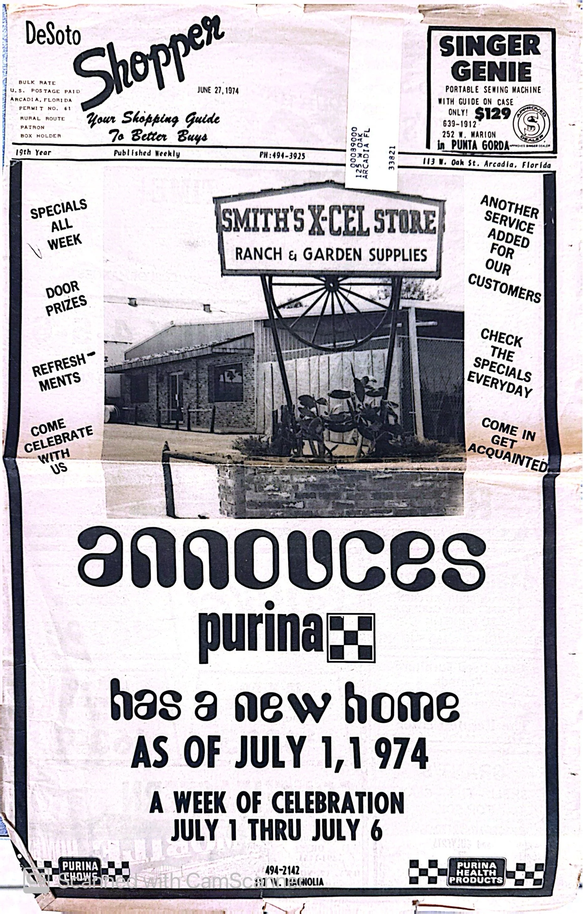 A newspaper advertisement from June 27, 1974, promoting a grand opening event for Smith's X-Cell Store, a ranch and garden supplies business, with special weekly deals, door prizes, and celebrations from July 1 to July 6. The ad features a photograph of the store with a large sign and mentions products like Purina.