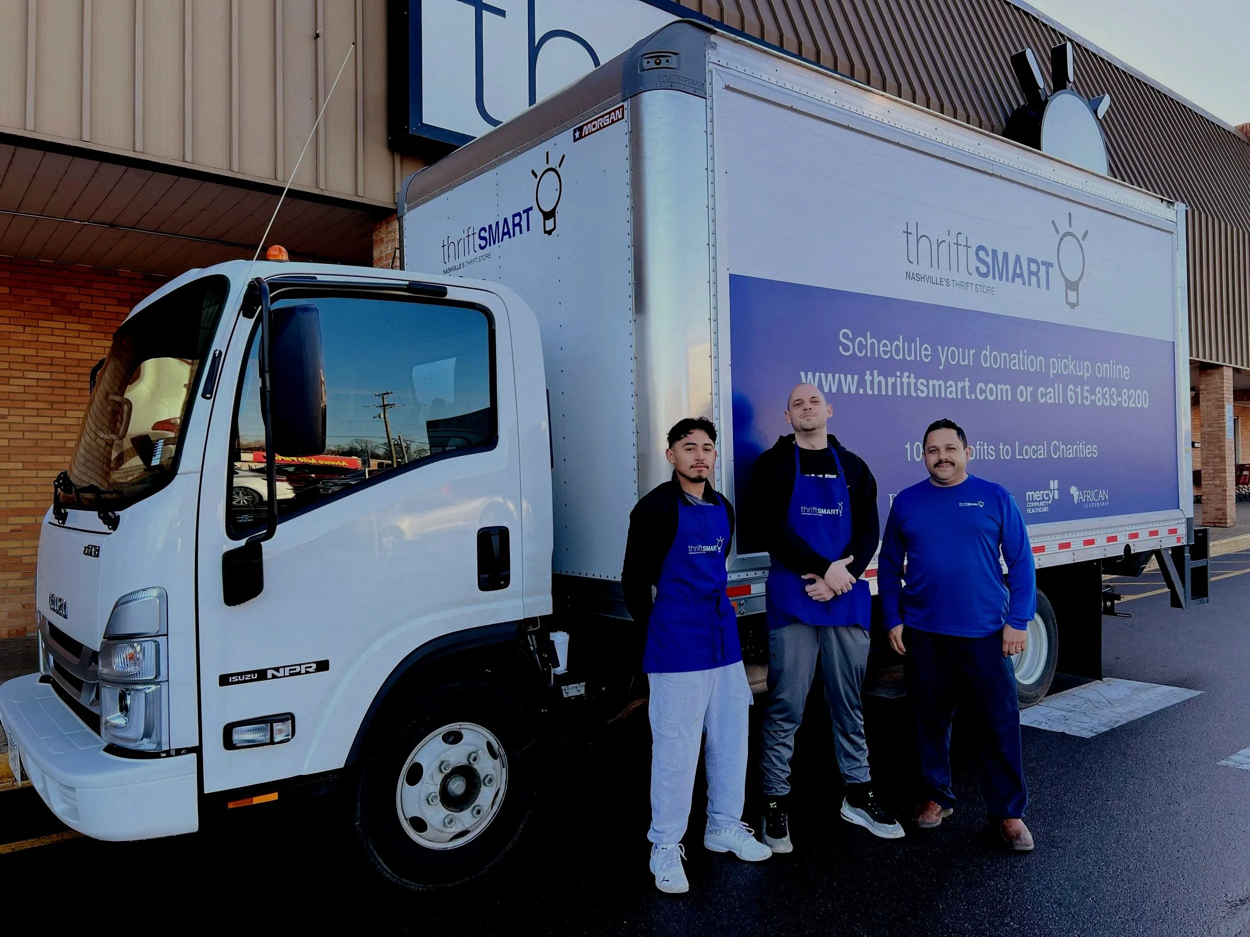 ThriftSmart Truck and Drivers.jpg