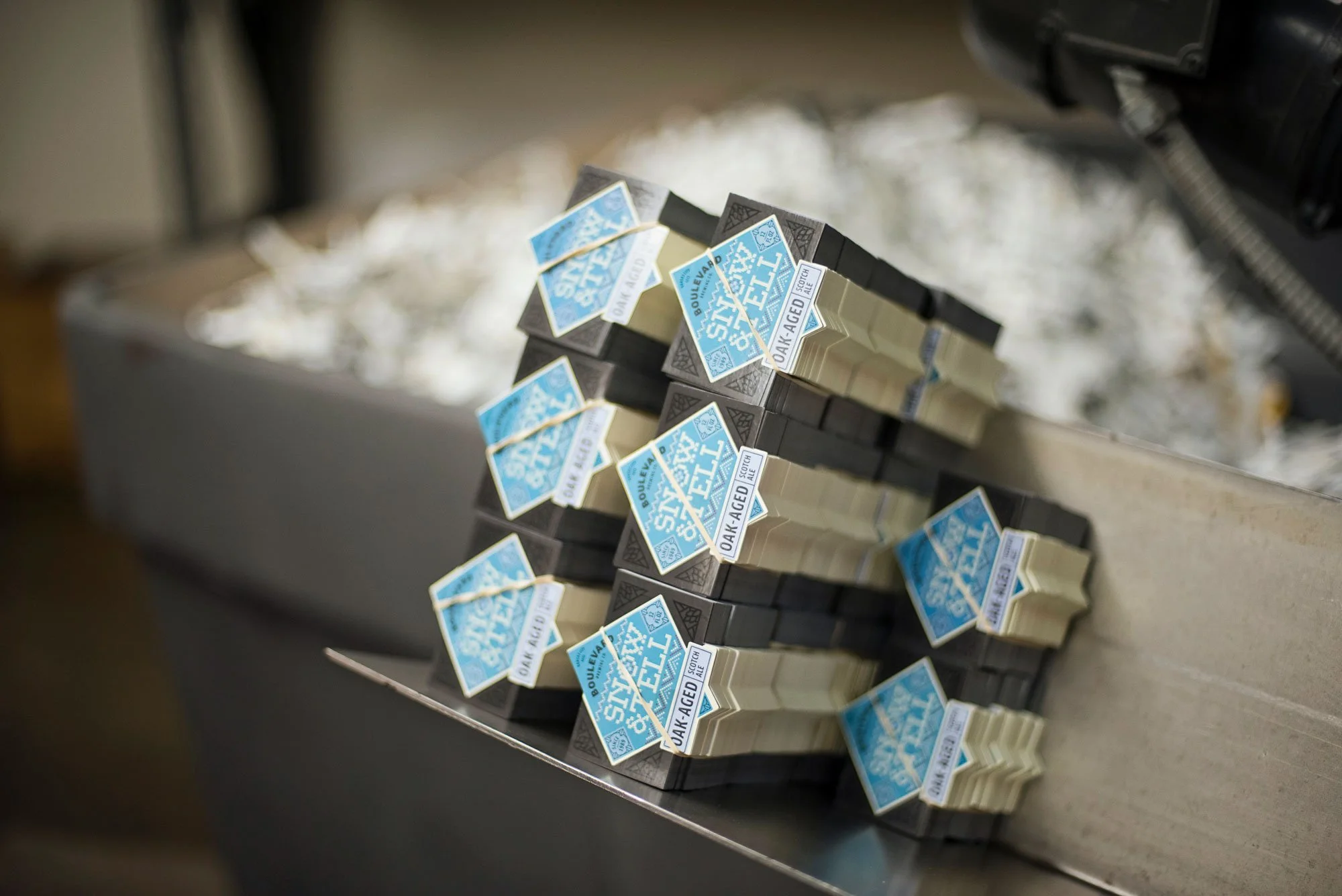 Bottles of beer labels stacked.
