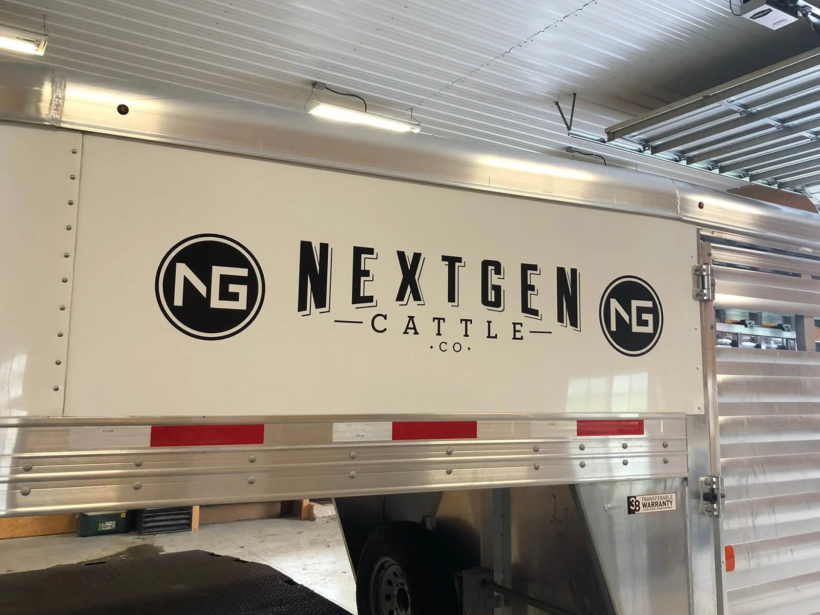 A food truck with the name 'NextGen Cattle Co.' displayed on the side, featuring the logo with the initials 'NG' inside a black circle.