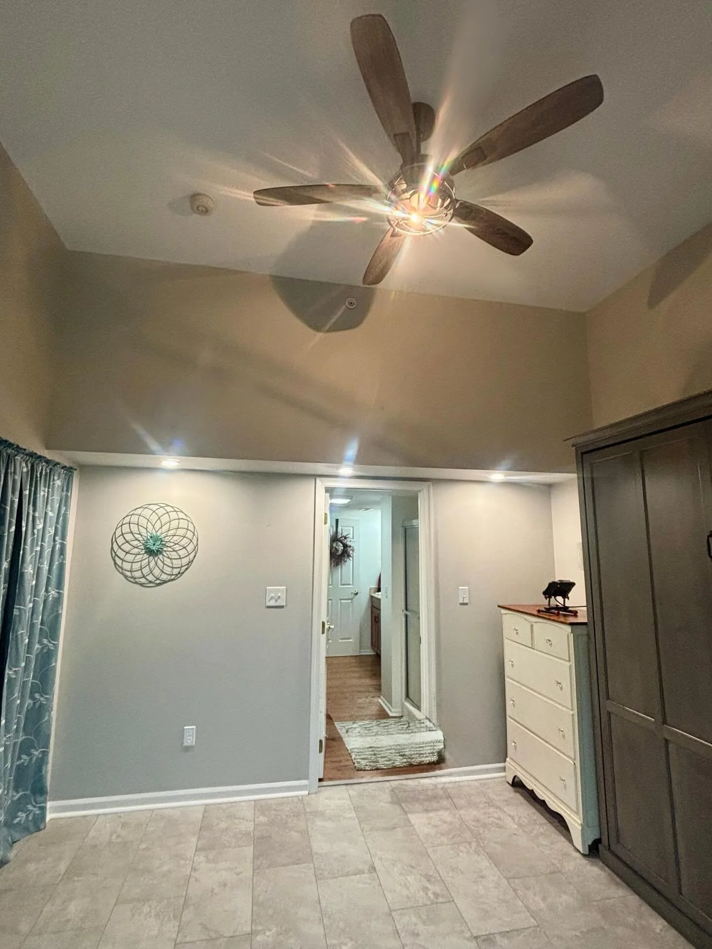 🎨 This arts and crafts room needed recessed lighting and a ceiling fan. The customer was thrilled we were able to complete the job without attic access and no need for drywall repair.
