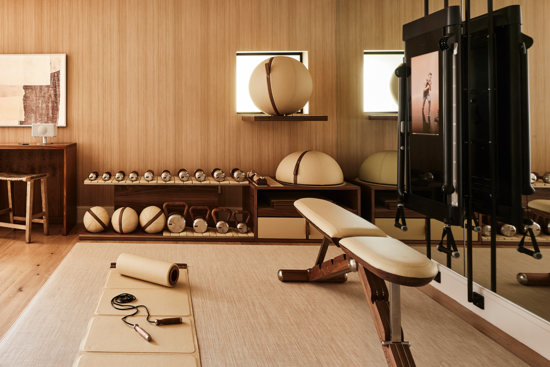 Union Street project custom home gym with sleek built in millwork, organized weights and mats, and soft neutral finishes, creating a private workout space that feels refined and functional