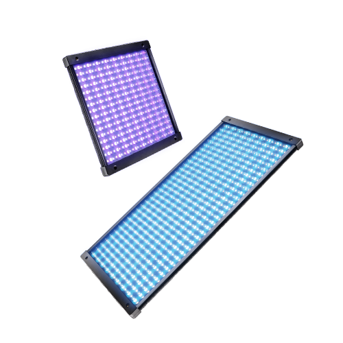 Two LED light panels, one emitting purple light and the other blue light, placed on a flat surface.