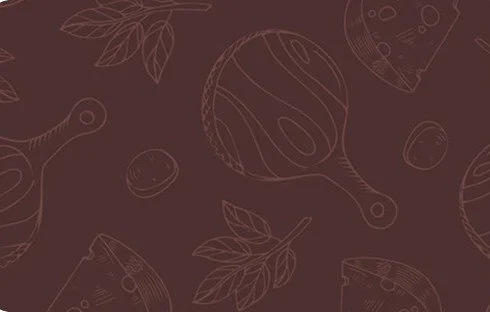 Line drawings of vegetables and leaves on a brown background.