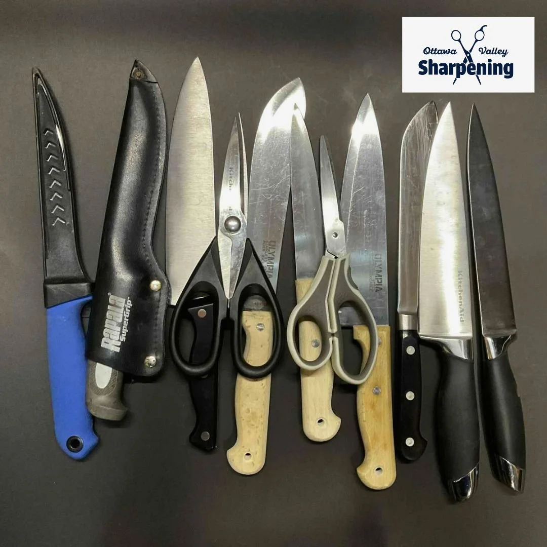 A collection of various kitchen knives, scissors, and a sharpening tool arranged on a dark surface, with a logo in the upper right corner that reads 'Ottawa Valley Sharpening'.