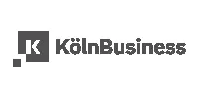 Logo von KölnBusiness, bestehend aus einem schwarzen Quadrat mit einem weißen Buchstaben 'K' und dem Text 'KölnBusiness' daneben.