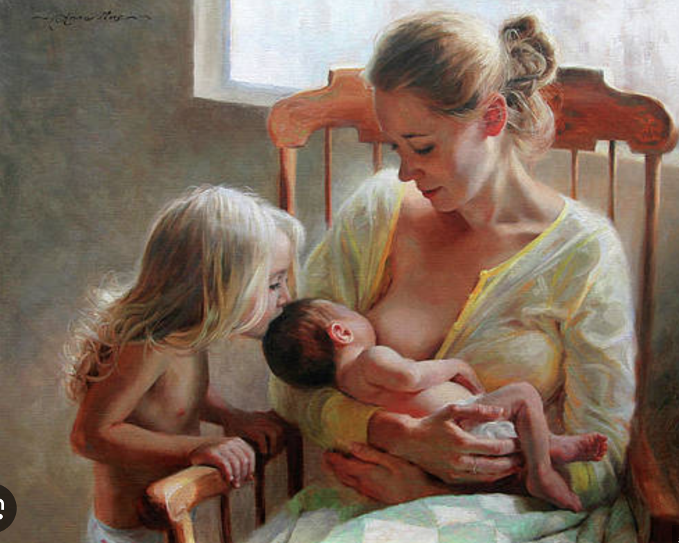 A woman with her hair in a bun, sitting on a wooden chair, breastfeeding a newborn baby. A young girl with long blonde hair, also topless, looking at the baby and leaning on the chair's armrest.
