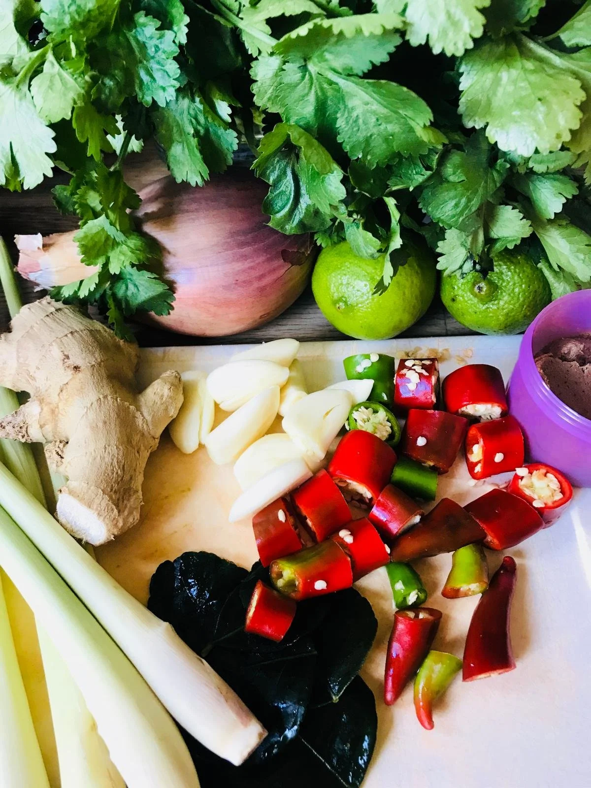 image showing thai ingredients including ginger, lime, chilli and shrimp paste