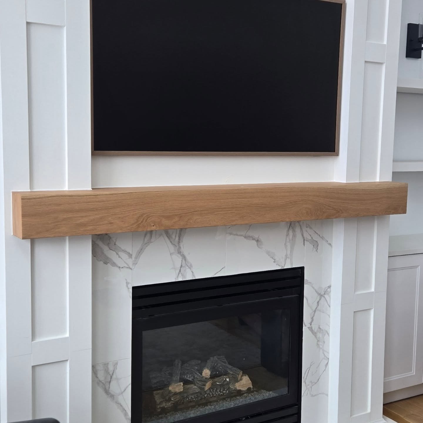 Clean and simple White oak mantle instal for a neighbour this week. Nothing like solid wood to warm up a room! #beardbrotherswoodworking #beardbrothers #woodworking #winnipeg