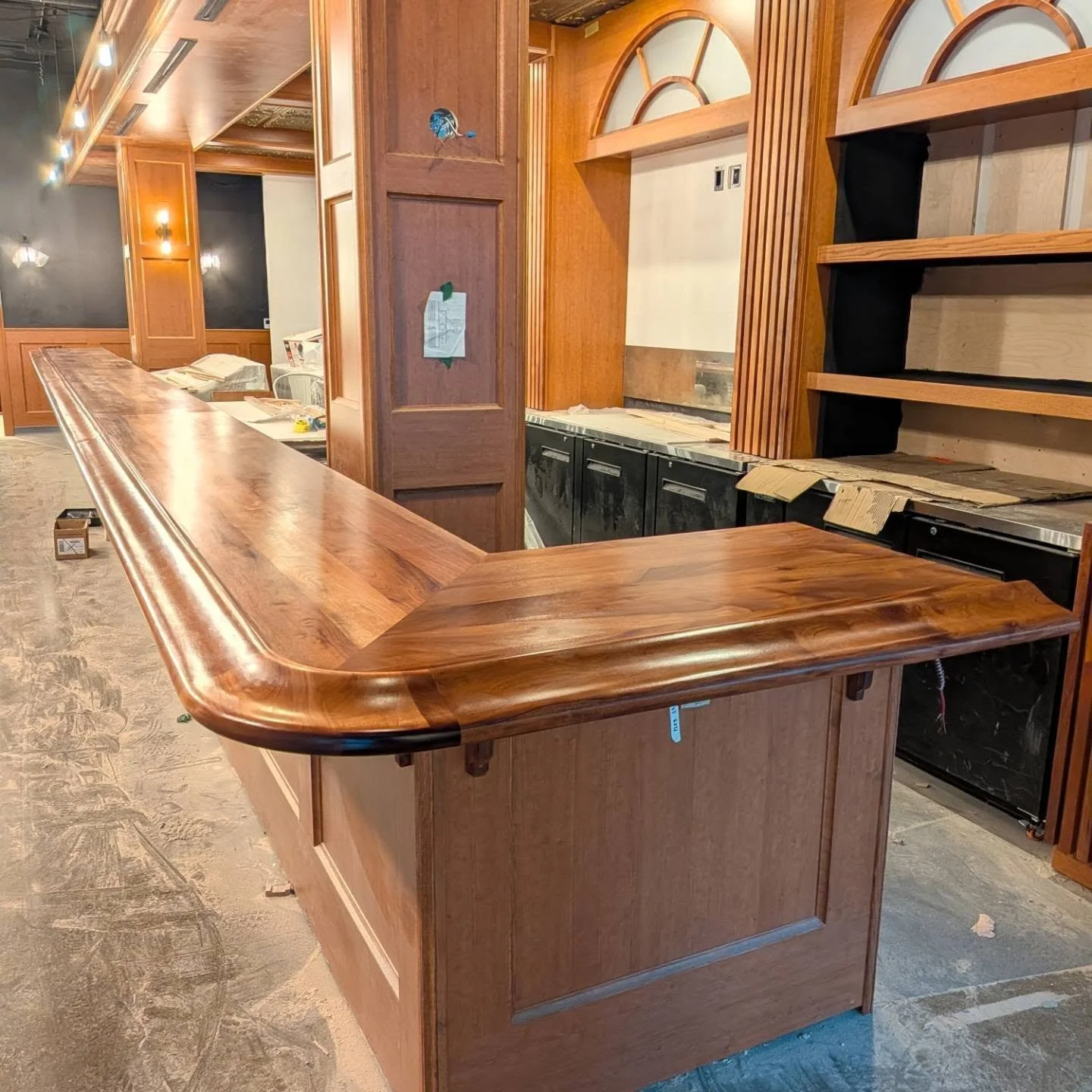 A culmination of months of work finally came together. From  material selection, scratching my head over the molding and incorporating a few new tools in the shop, this bar takes the cake.  Solid mahogany top and moldings all created in house. (Ok so