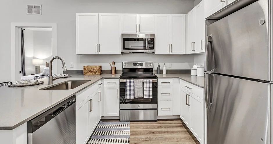 From morning coffee to late-night snacks, this kitchen has you covered ☕🍕 Discover the perfect space for every moment at Olive and Wooster Apartments. 

#NewHavenLiving #LuxuryApartments #WoosterSquare #ApartmentLife #KitchenGoals #HomeInspiration #