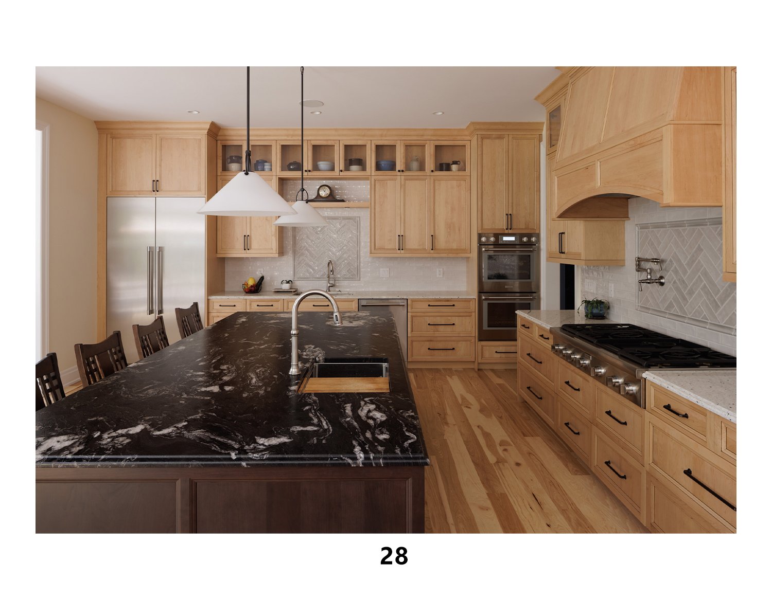 Modern kitchen with light wood cabinets, black marble island, stainless steel appliances, and white tile backsplash.