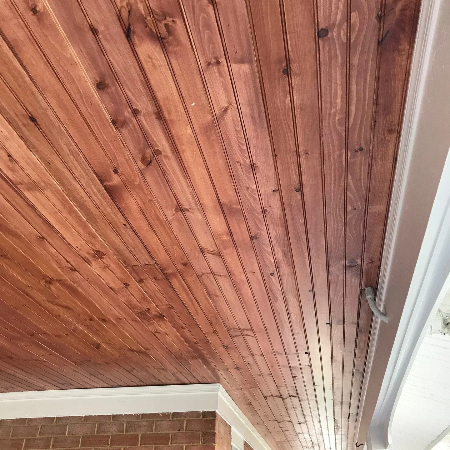 New porch ceiling with v-groove headboard. Stained and sealed with satin spar urethane. A fresh and durable upgrade.