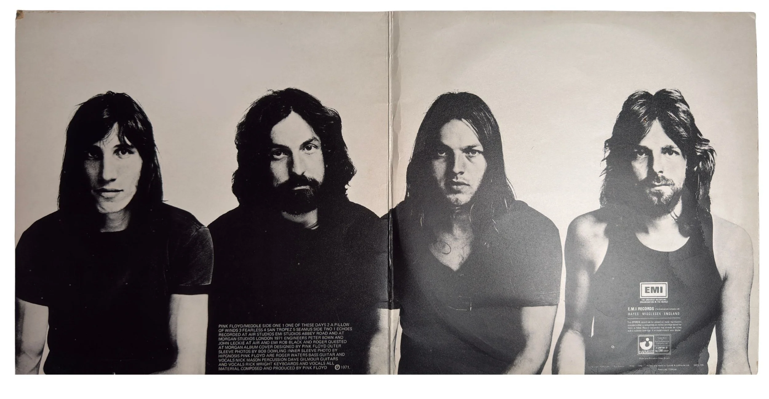 The Classic Pink Floyd Line Up photographed in Black and White . Left to Right - Roger Waters, Nick Mason, David Gilmour, Rick Wright. Taken from the gatefold cover of Meddle.