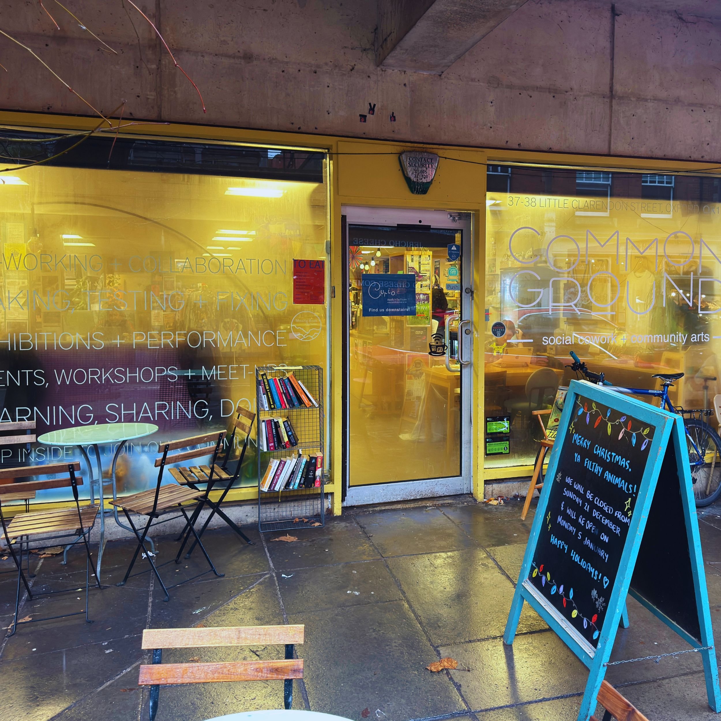 The entrance to Common Ground Cafe on a rainy day in Oxford