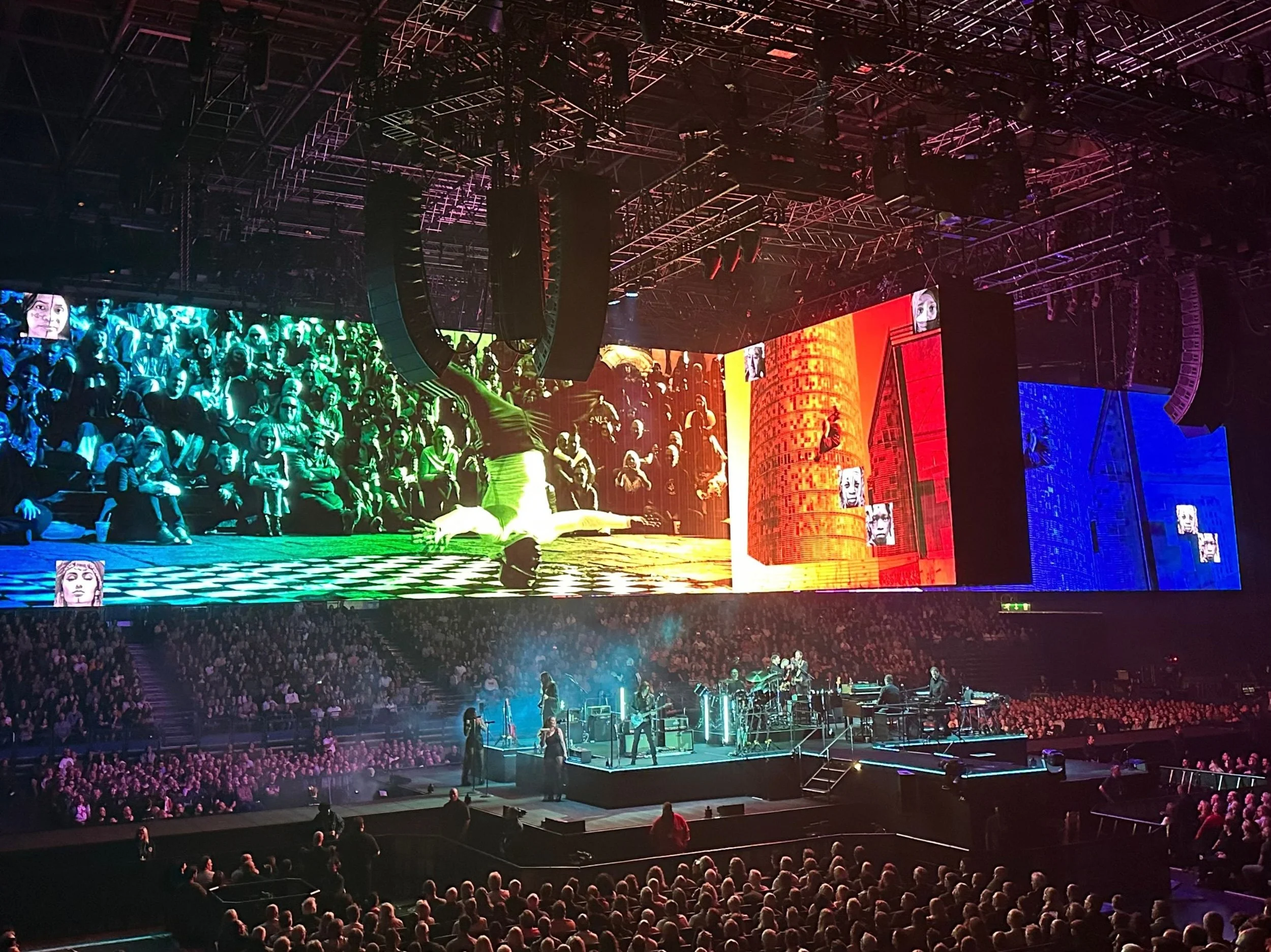Roger Waters performing on the central in-the-round stage at Utilita Arena Birmingham during The Dark Side of the Moon set.