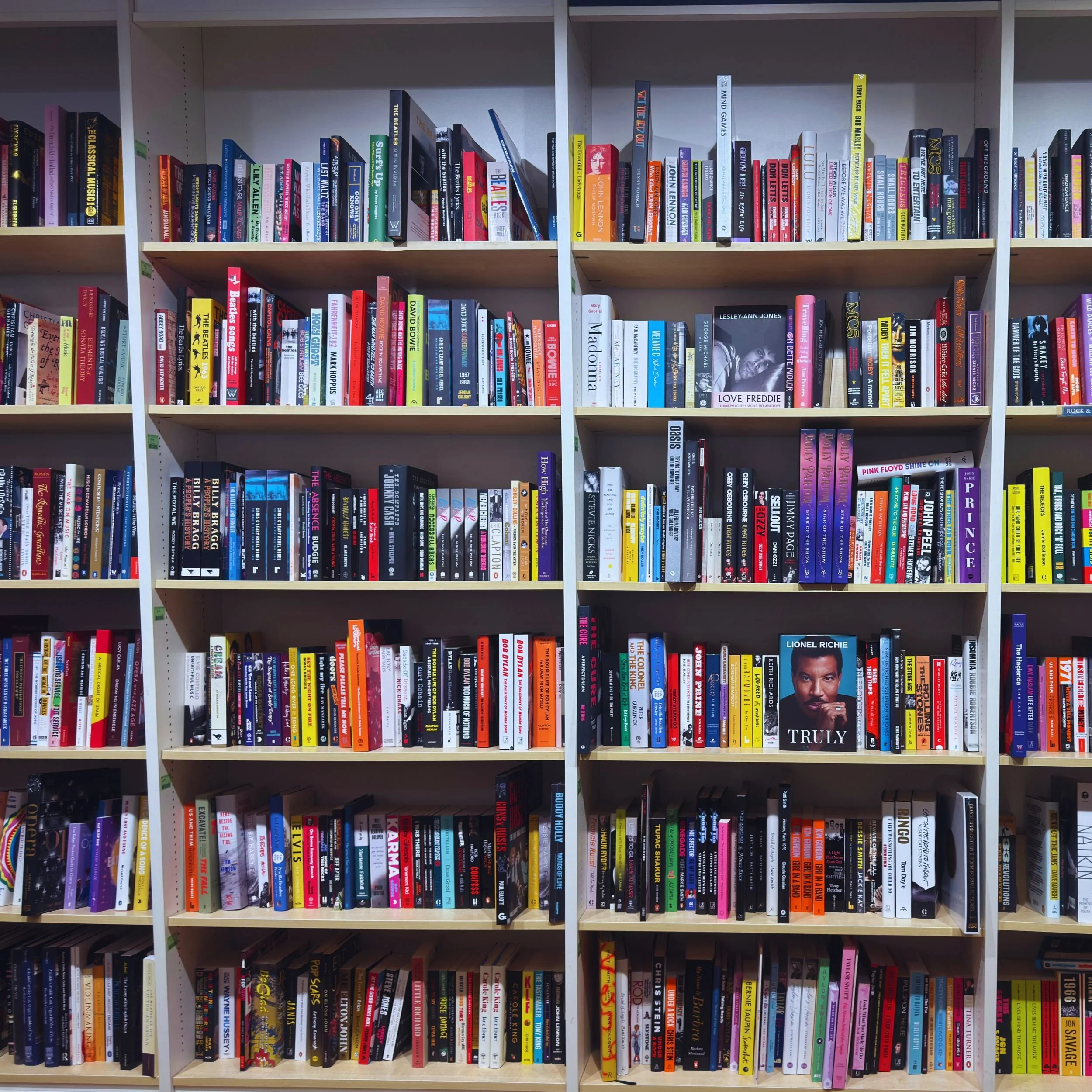 Inside Blackwell's Music Shop with shelves of brightly coloured music books