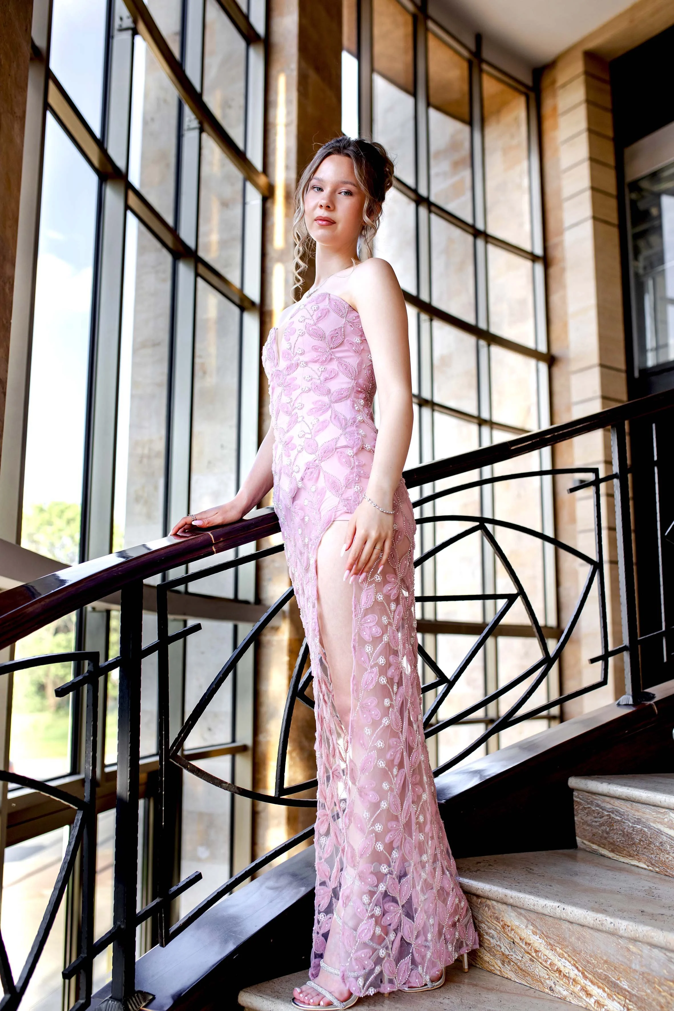 beautiful prom girl with curls and blue eyes