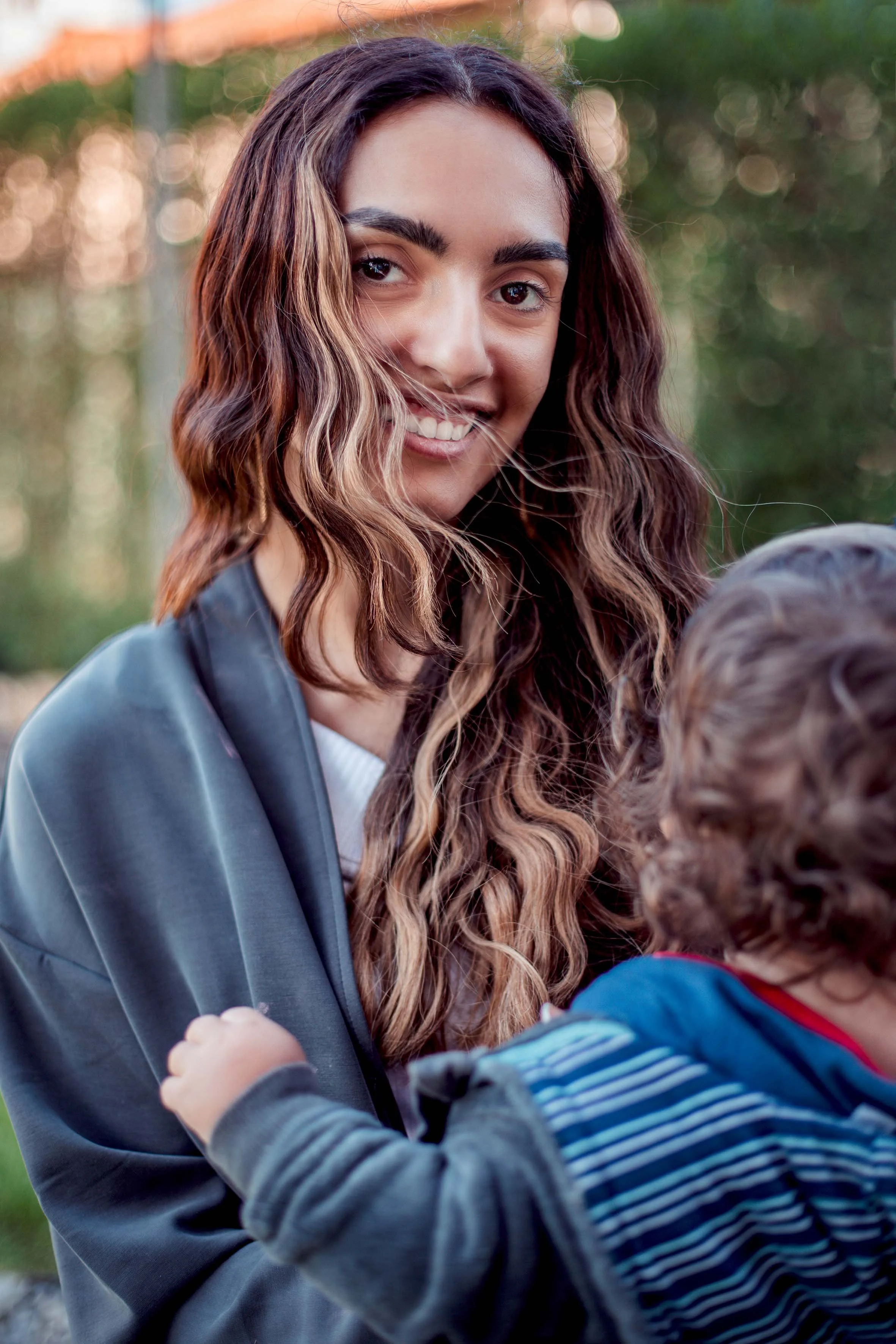 beautiful mama with her child photography