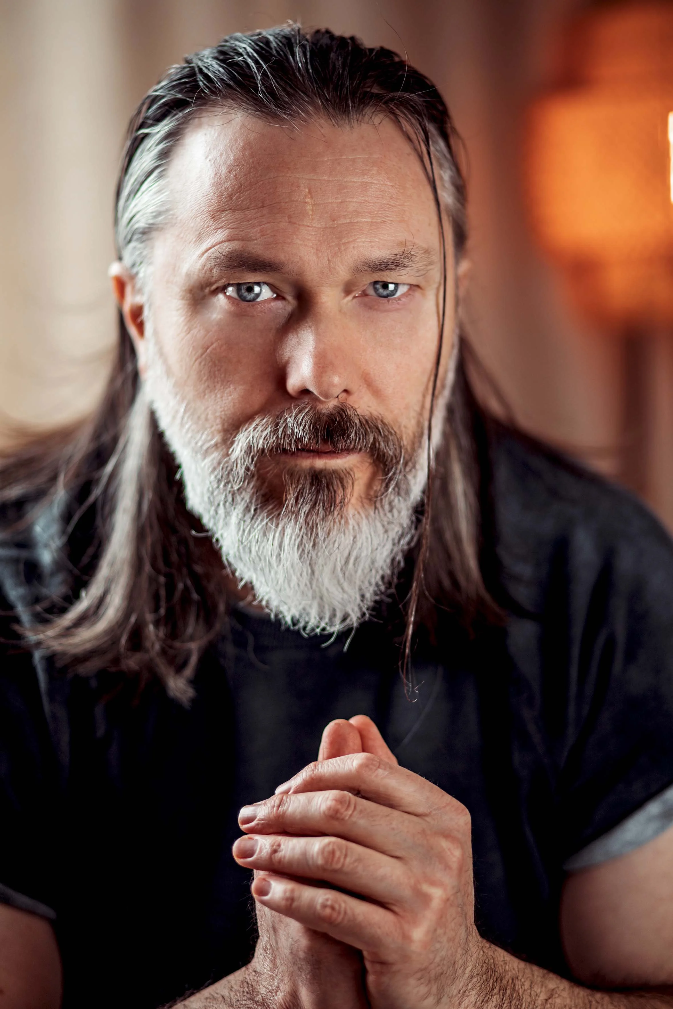 a portrait of a beautiful man with blue eyes professional photoshoot