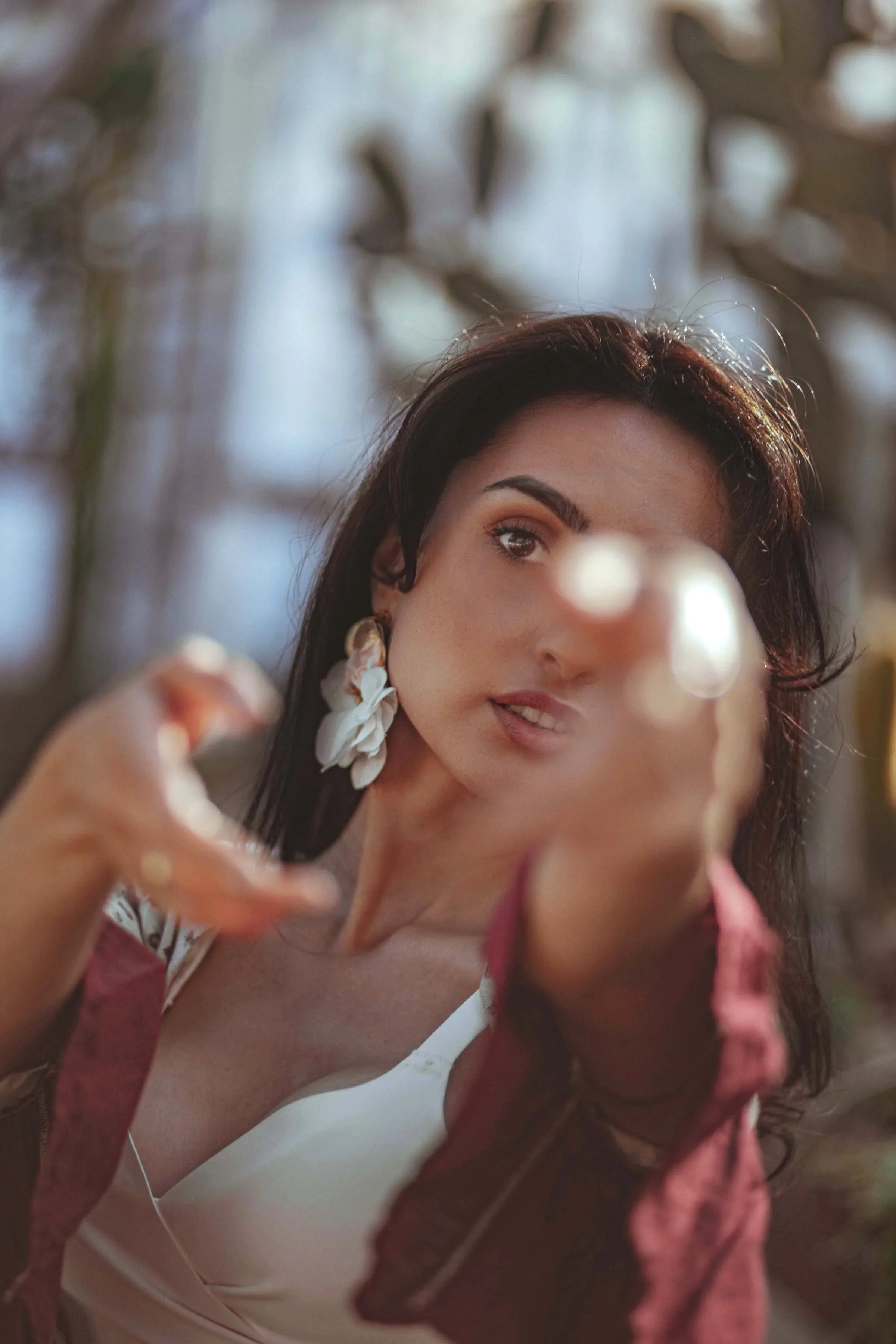 professional photoshoot of a beautiful woman in the botanical garden