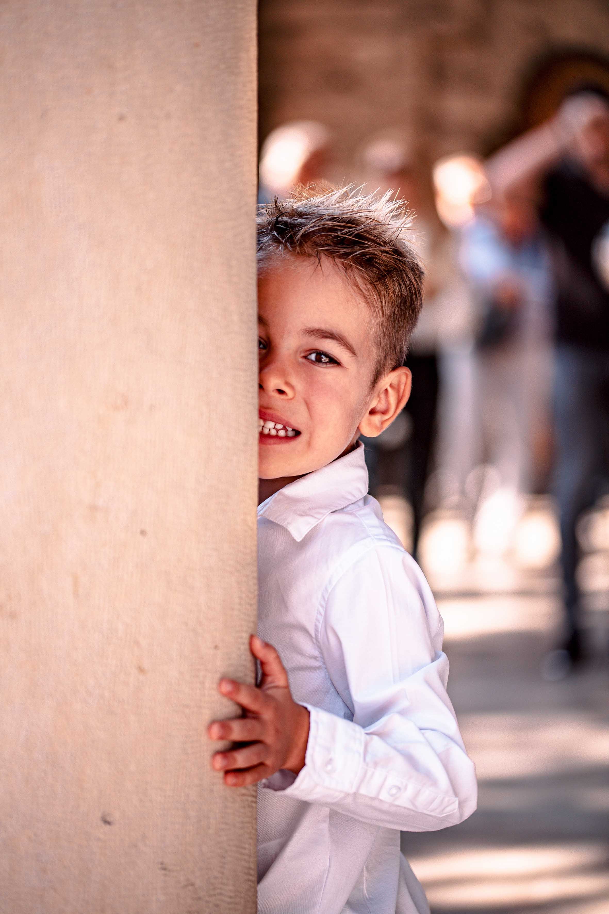 a little boy with blue eyes photoshoot baptism