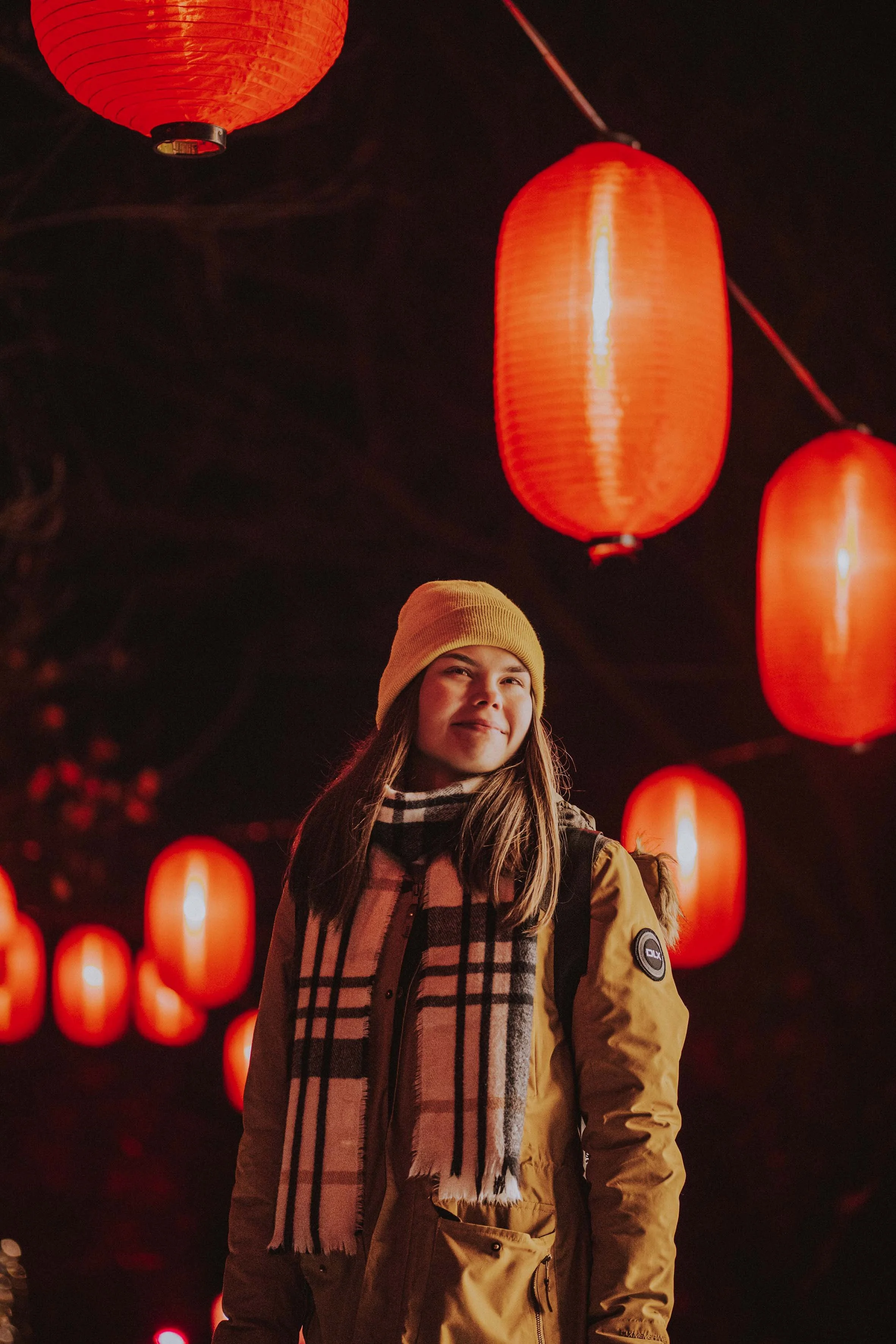 Chinese lights gentle girl outside