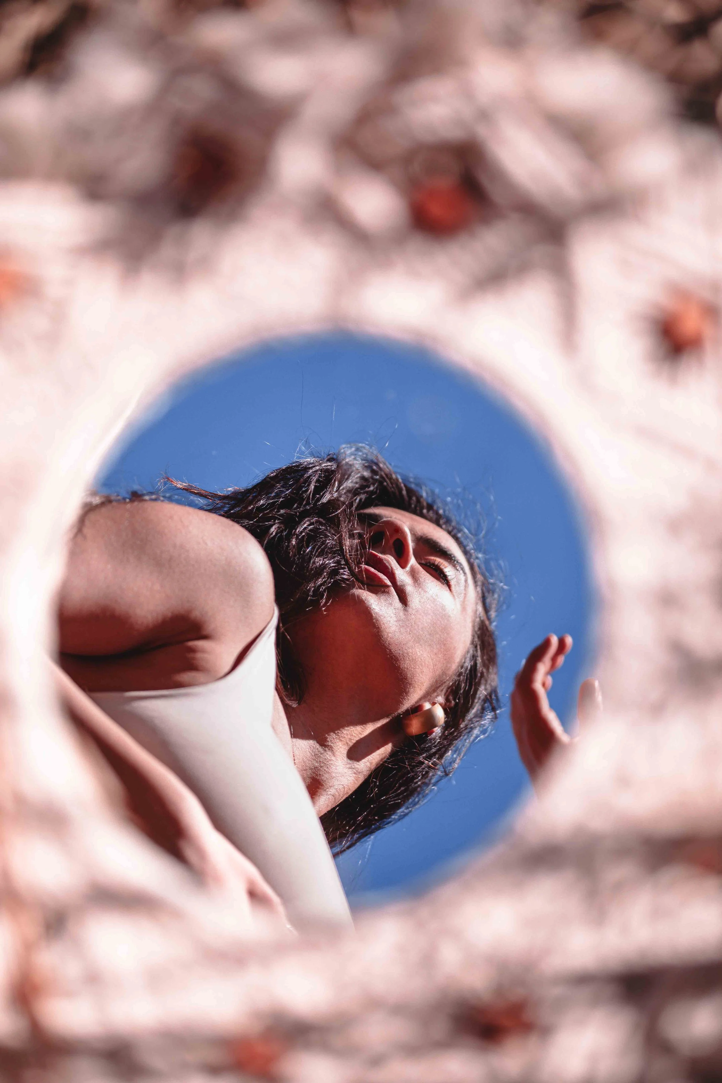 a girl reflection in a boho mirror