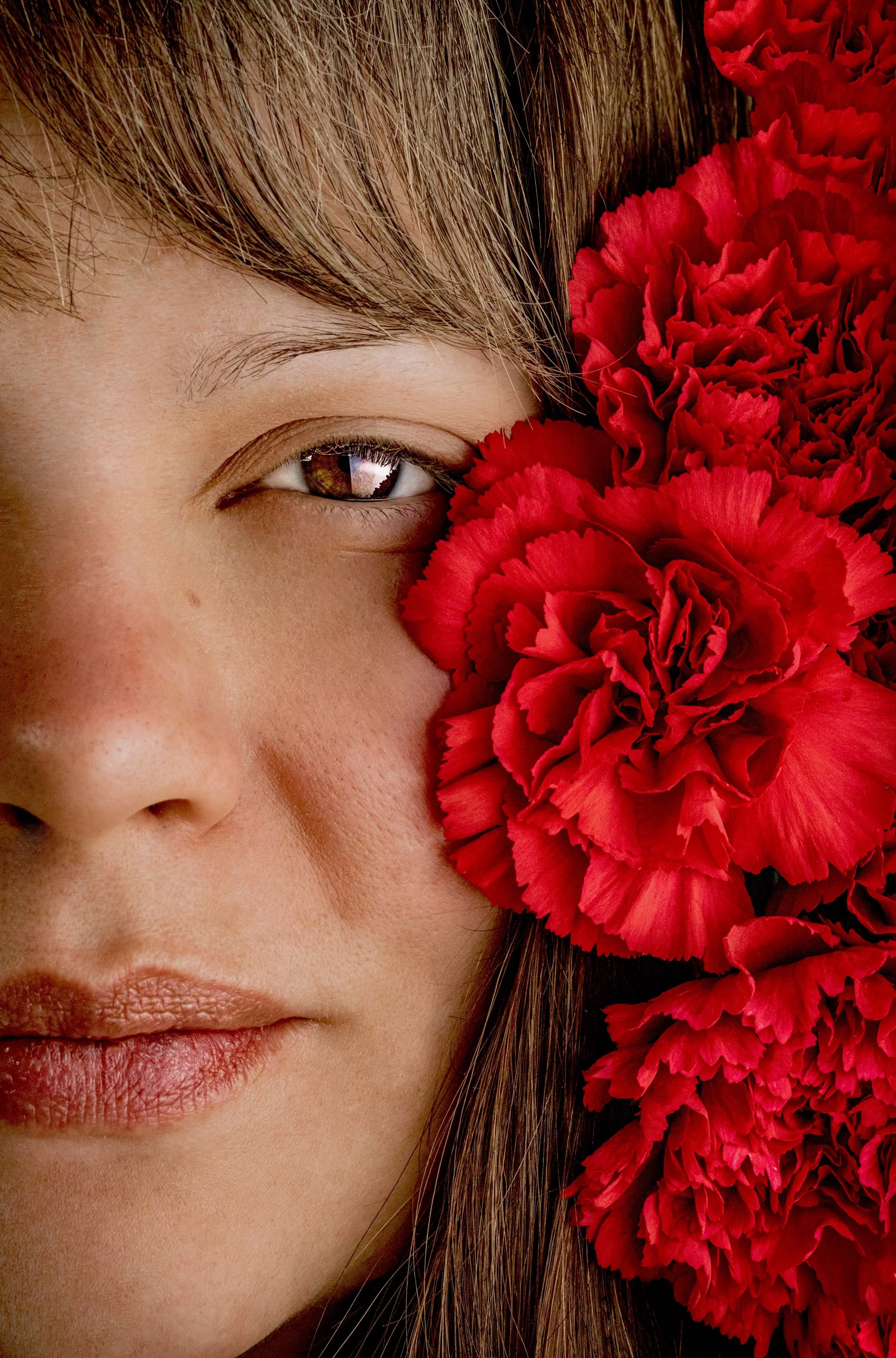 girl with red flowers photoshoot