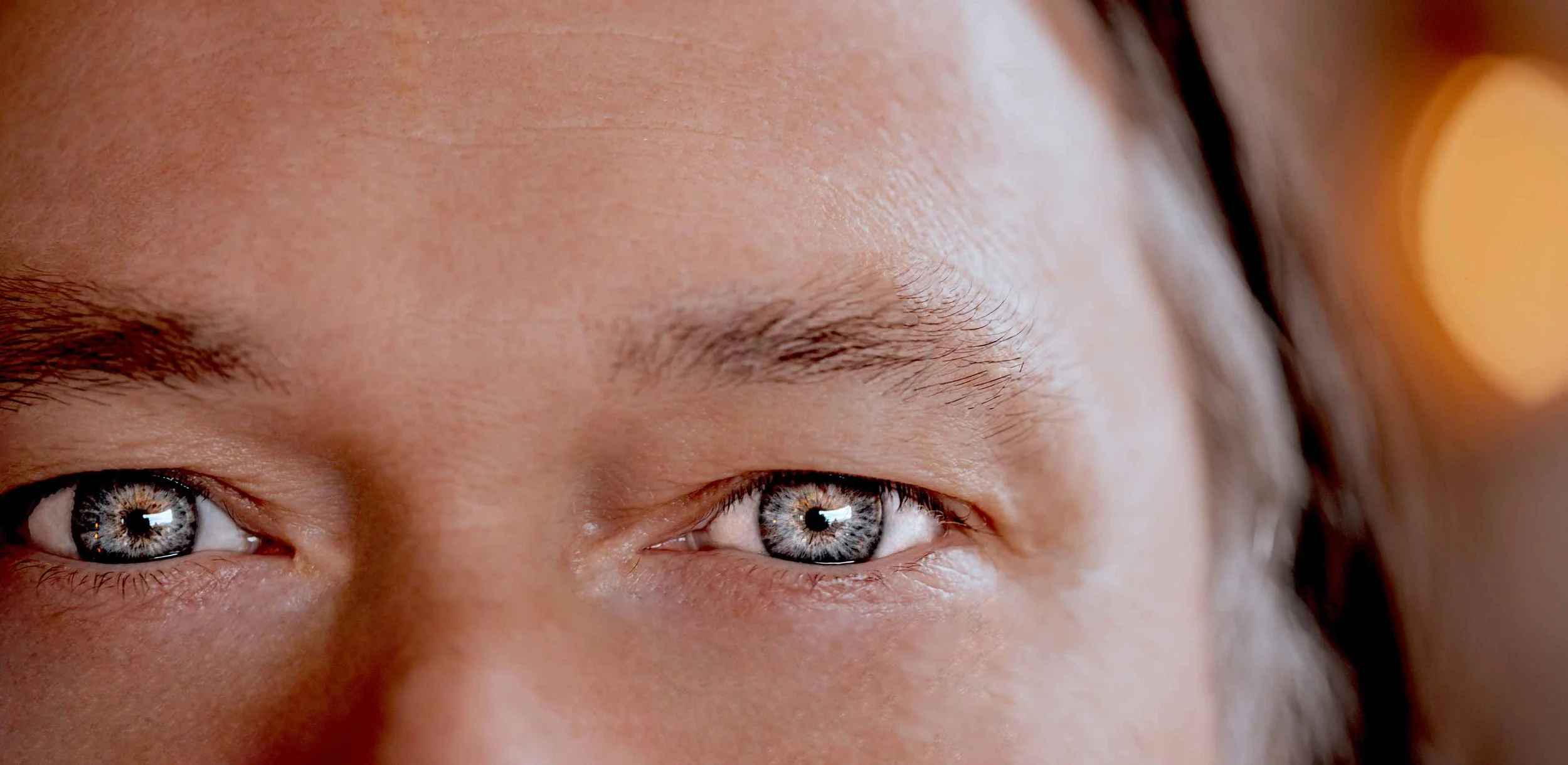 details photography blue eyes of a man