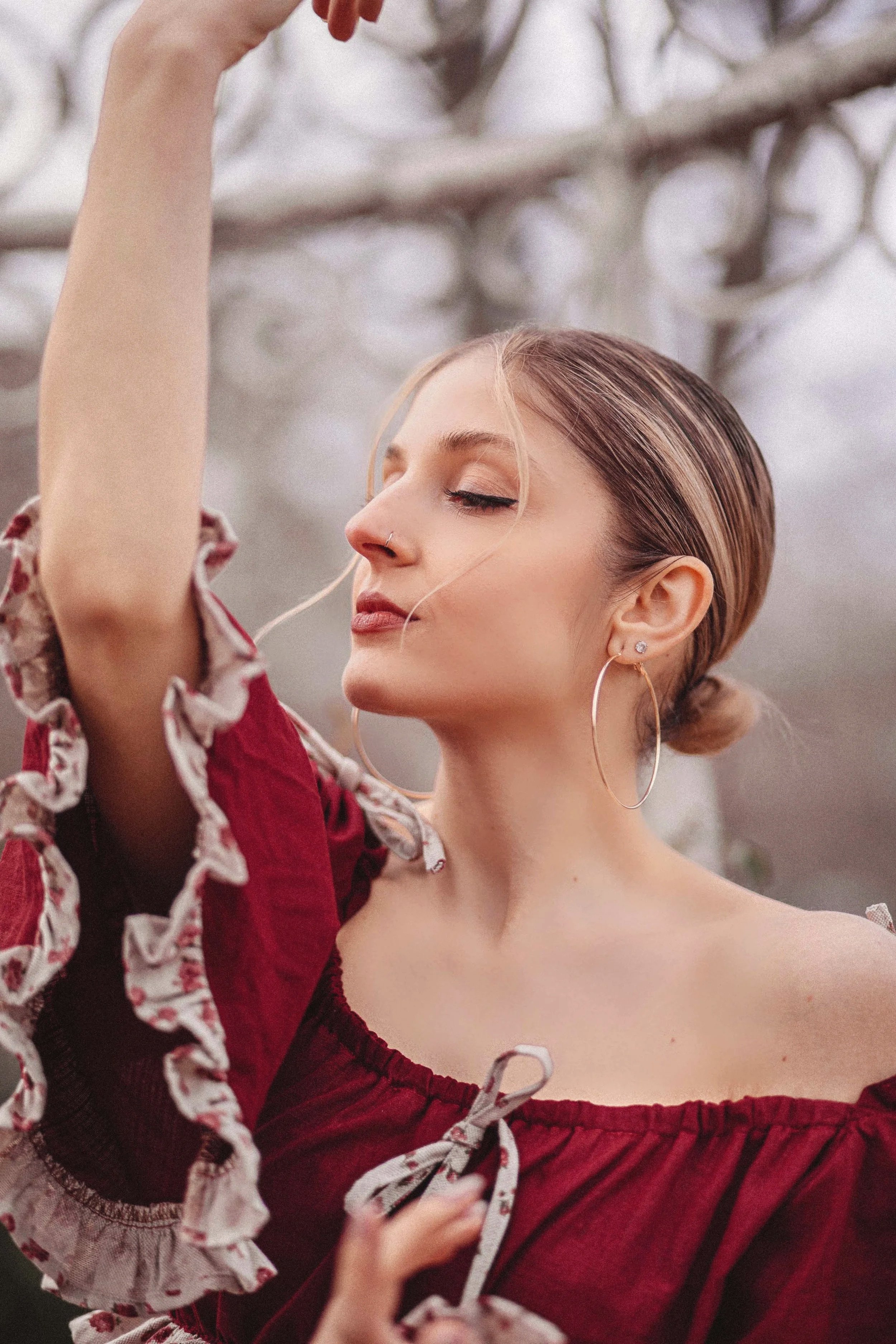 portrait of a spanish beautiful girl with red clothes dancing