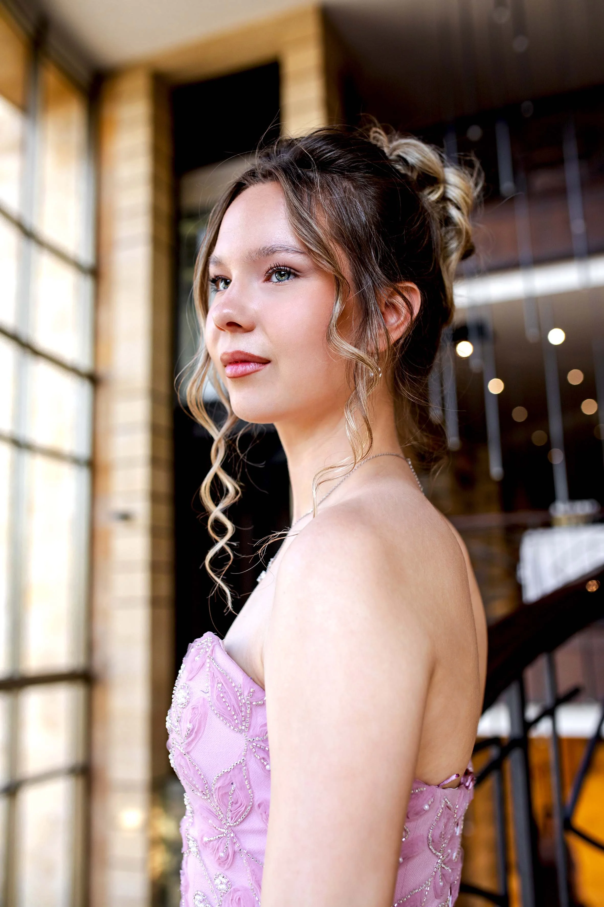 beautiful prom girl with curls and blue eyes