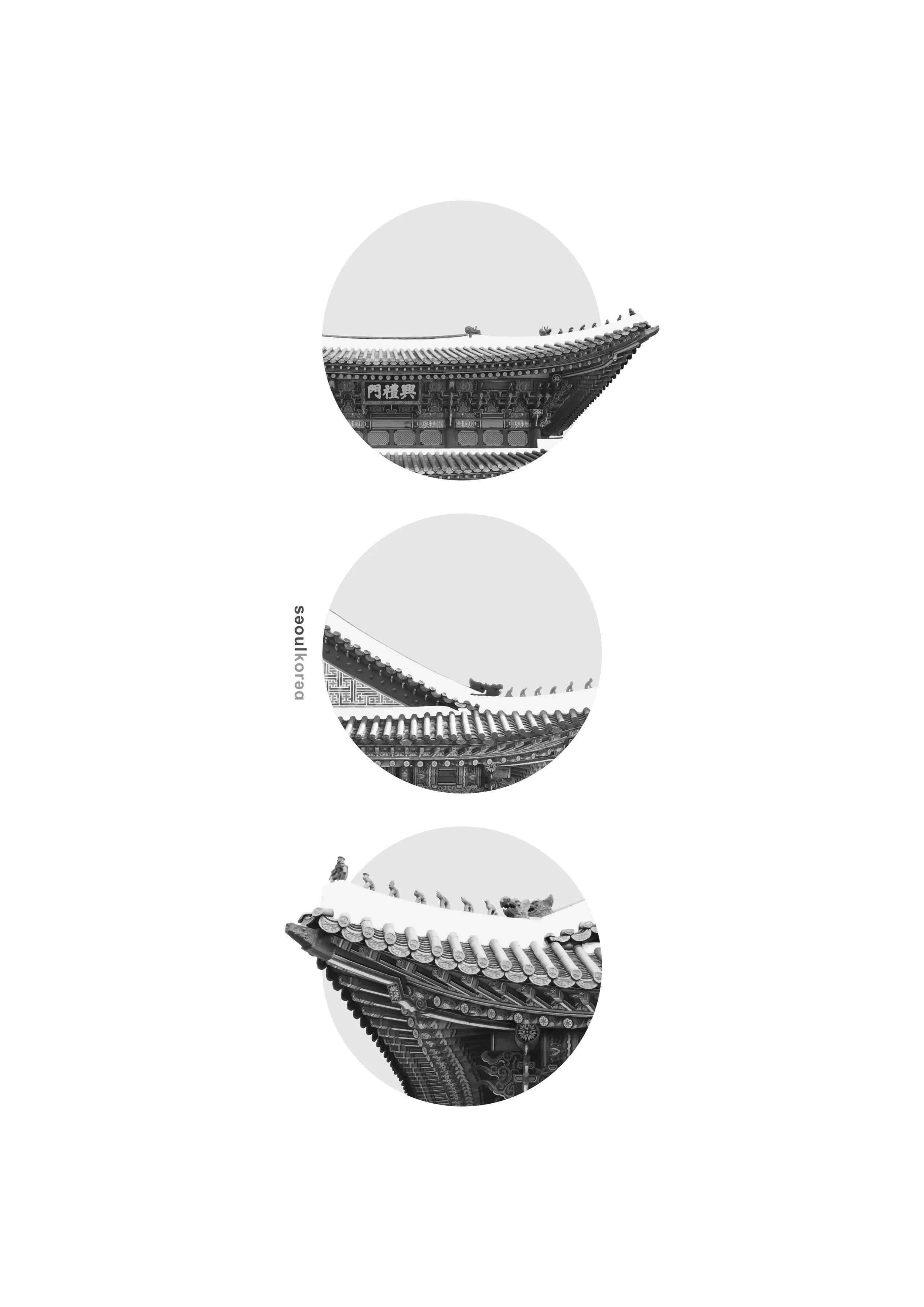 Black and white photograph of traditional East Asian temple roofs with ornate eaves and decorative elements.