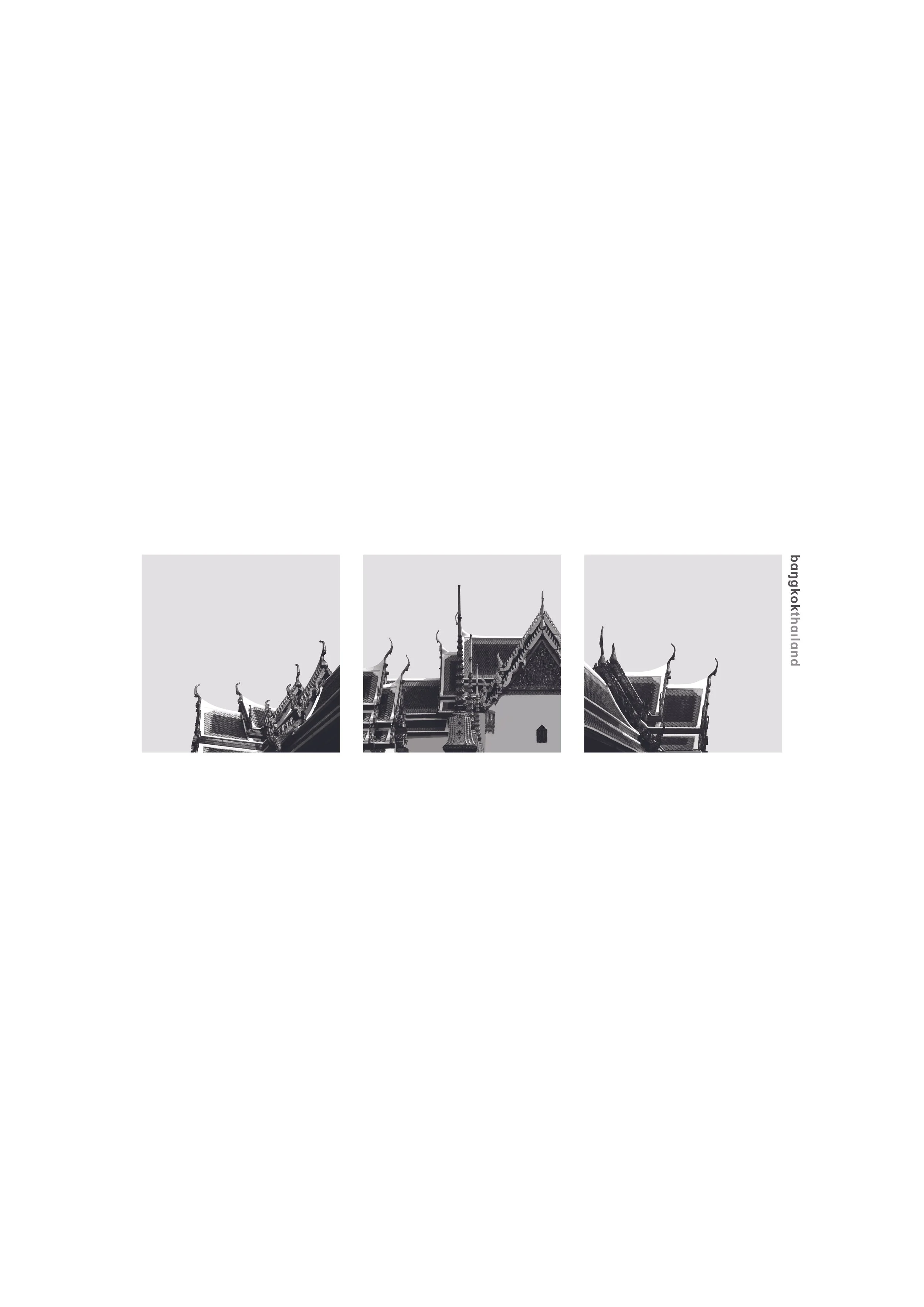 Black and white photo of traditional Thai temple rooftops with ornate, pointed decorations.