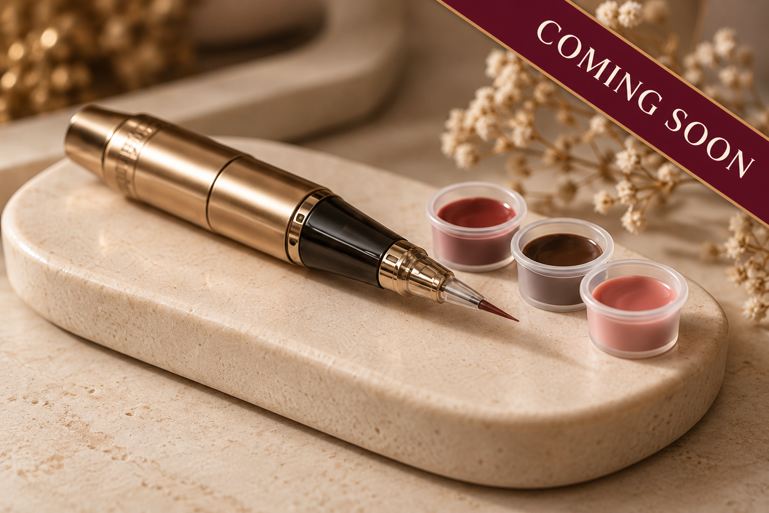 Gold cosmetic lip pigment pen with three color samples on a stone tray and a “Coming Soon” banner