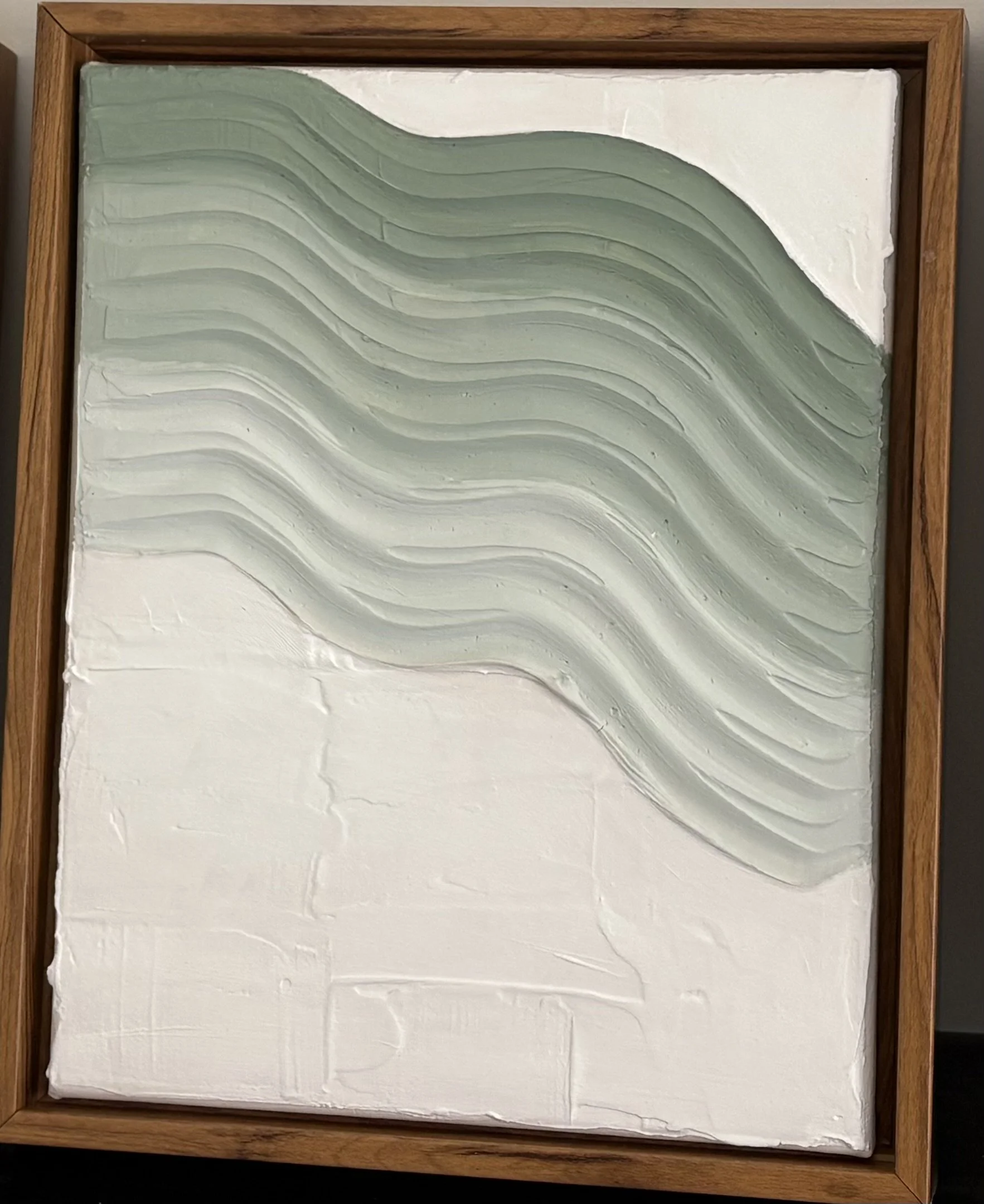 shades of green flow downward towards the side of the canvas