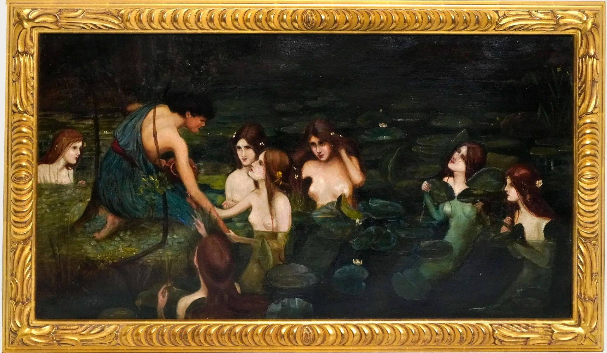 A classical painting depicting women and a man in a pond with water lilies, surrounded by a gold ornate frame.