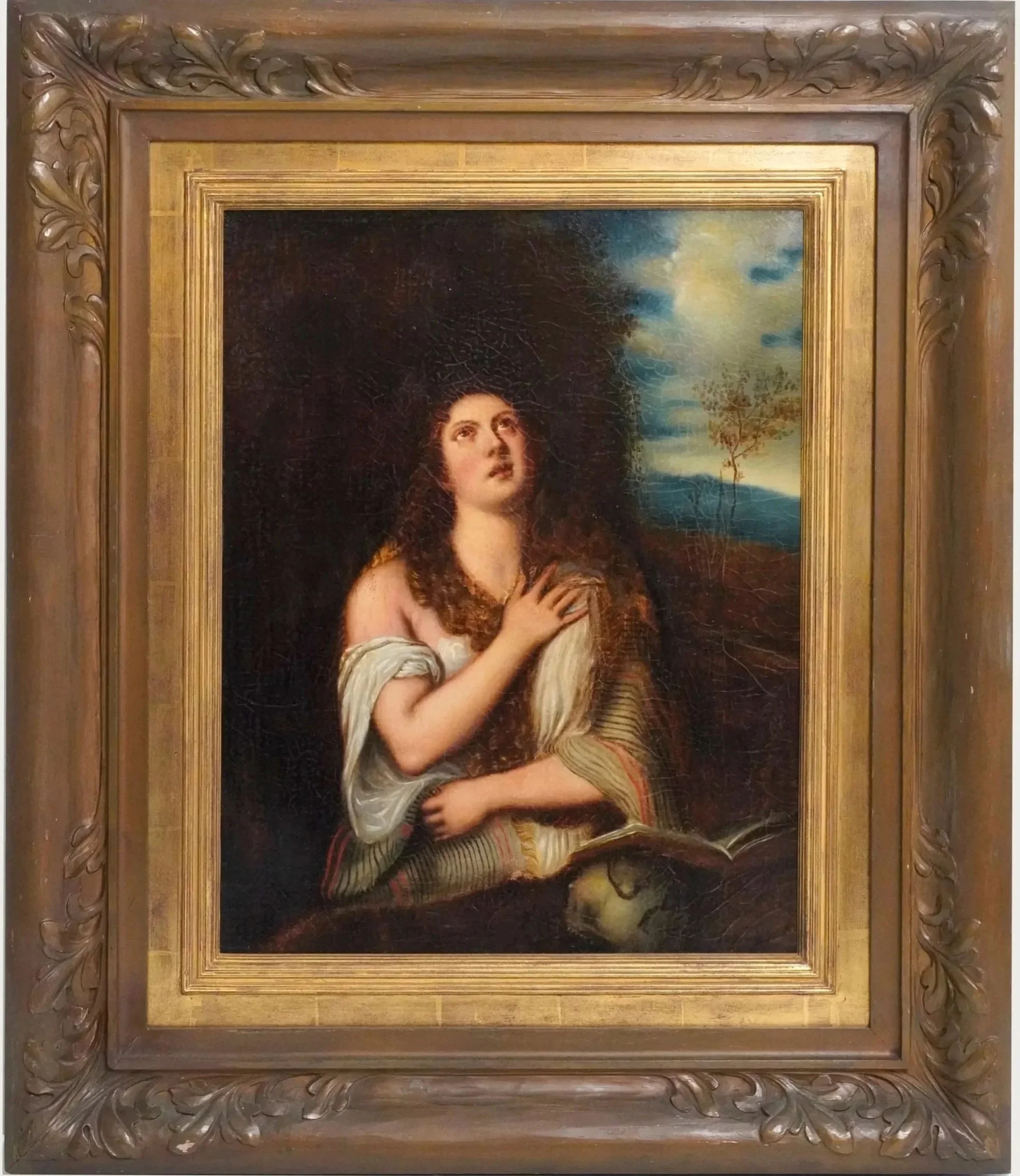A painting of a woman with curly hair and a white dress, looking upwards with her hands clasped. The background features a cloudy sky and natural landscape, with an ornate wooden frame.