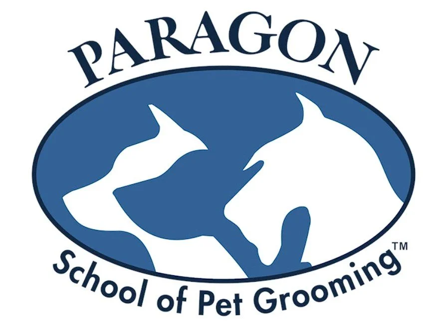 Paragon School of Pet Grooming logo with silhouette of a dog and a cat inside an oval.