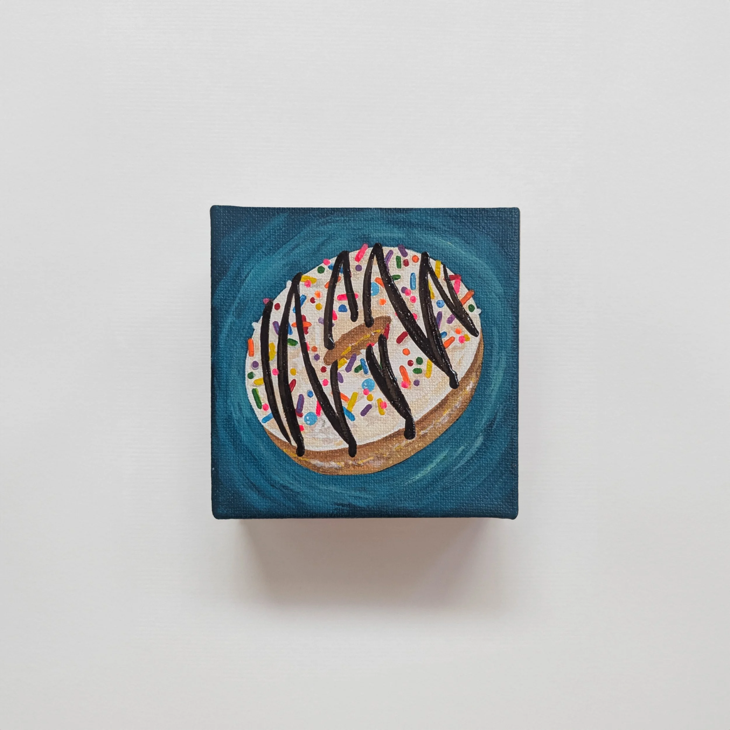 4x4-Donut-rainbowsprinkleschocodrizzleonteal.jpg