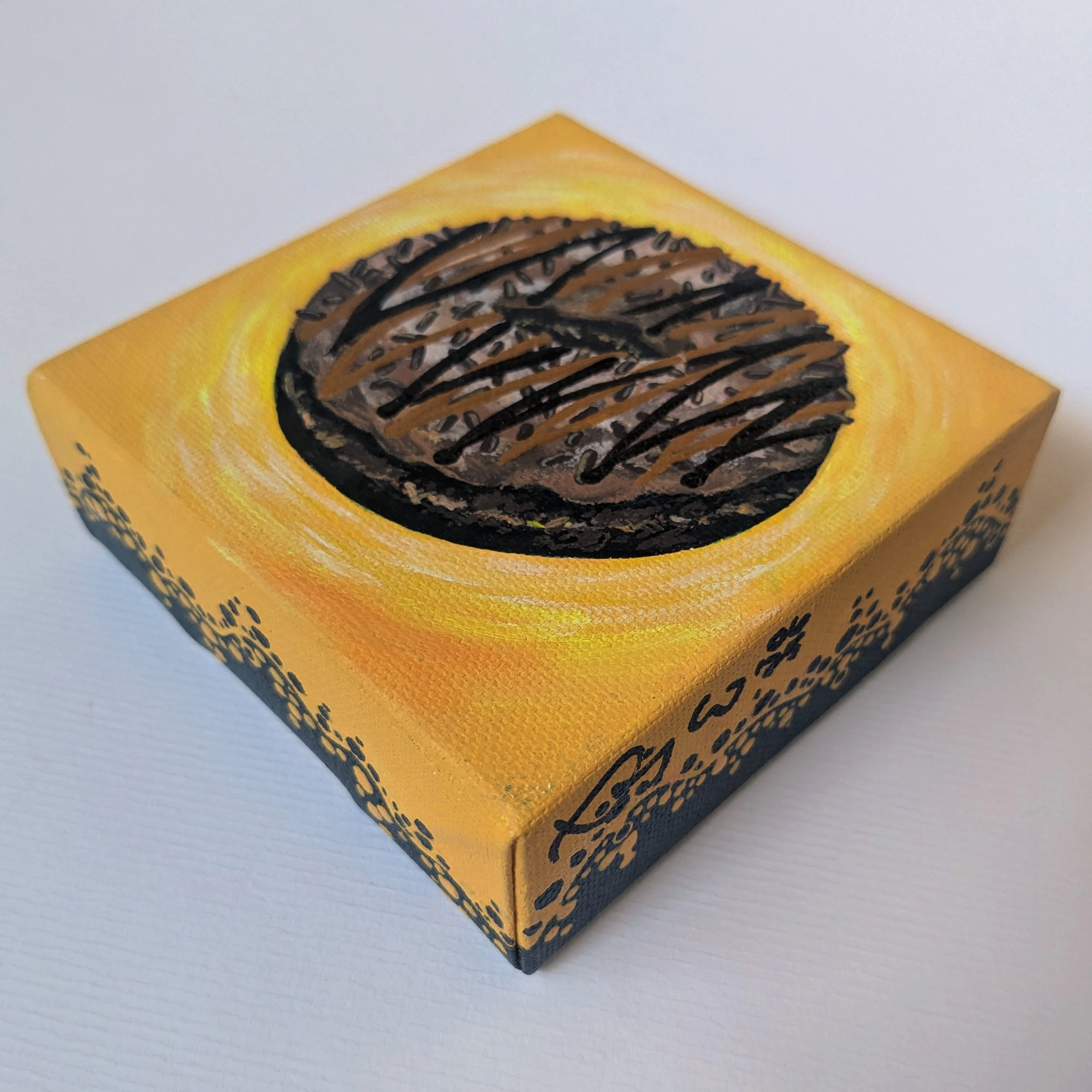 4x4-Donut-chococaramelsyrupbrownieonyellow-bottom.jpg